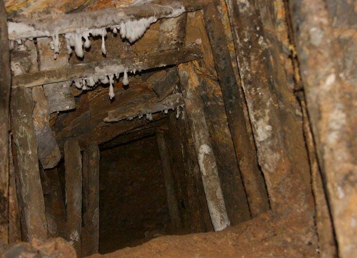 Two found dead and 20 trapped in Zimbabwe mine collapse