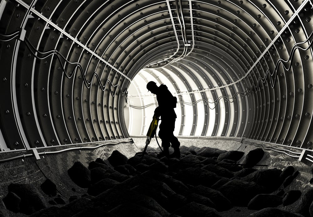 Worker in tunnel