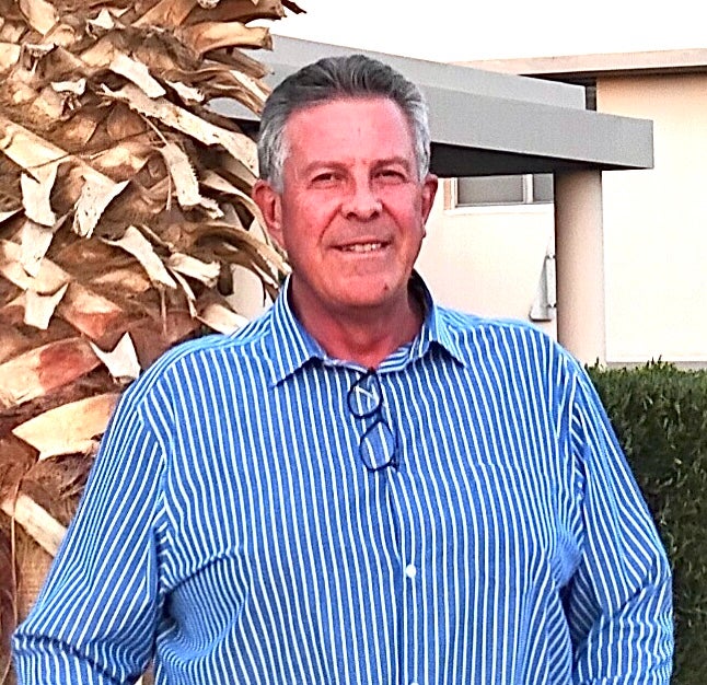 KENNETH LAREN, CMO, AMCO