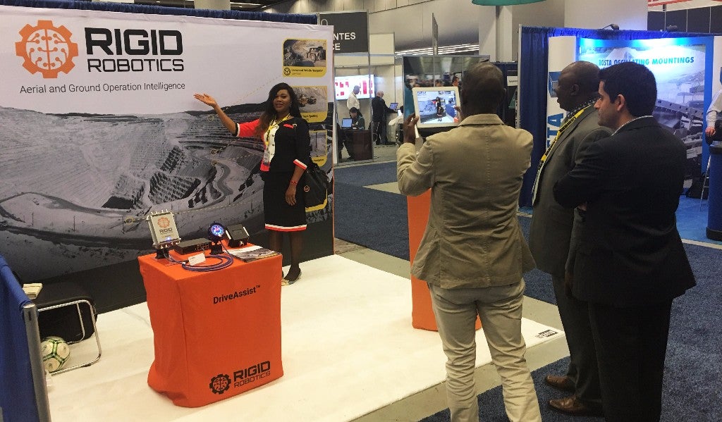 Our team was a little confused by this group, who boldly took over our booth so that they could pose for photos with our branding. Language barriers and cultural differences are often humorous at international events such as the CIM Expo.